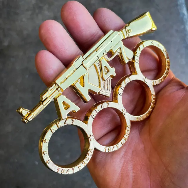 Gold-Finished Ak-47 Rifle Paperweight With Knuckle Grip Design 1